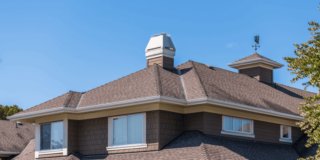 Modern home with asphalt shingles and clean roof lines, checking 4 balls rule roofing standards