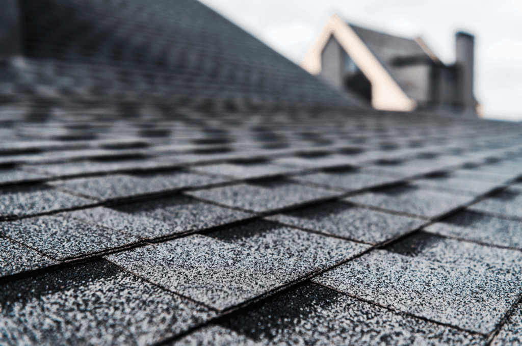 Close view of textured roofing surface showing strong flat roof materials built to handle rain, sun, and outdoor conditions.