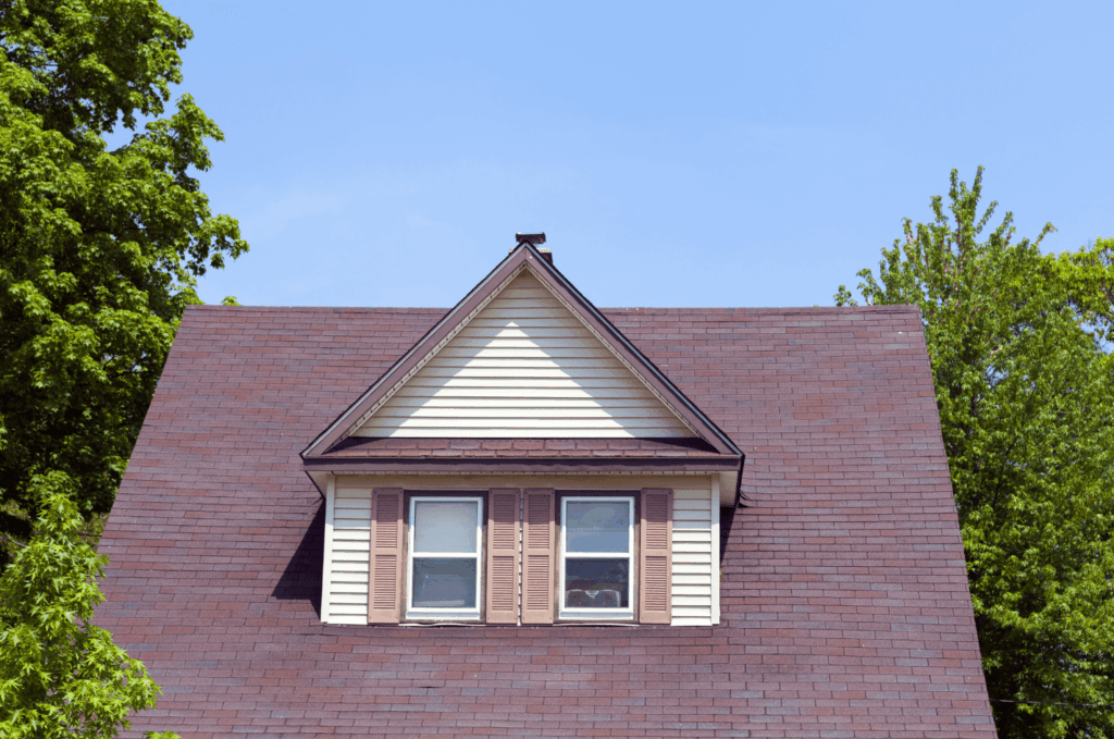 Well-maintained home roof after roof repair, showing clean shingles and strong protection against weather damage
