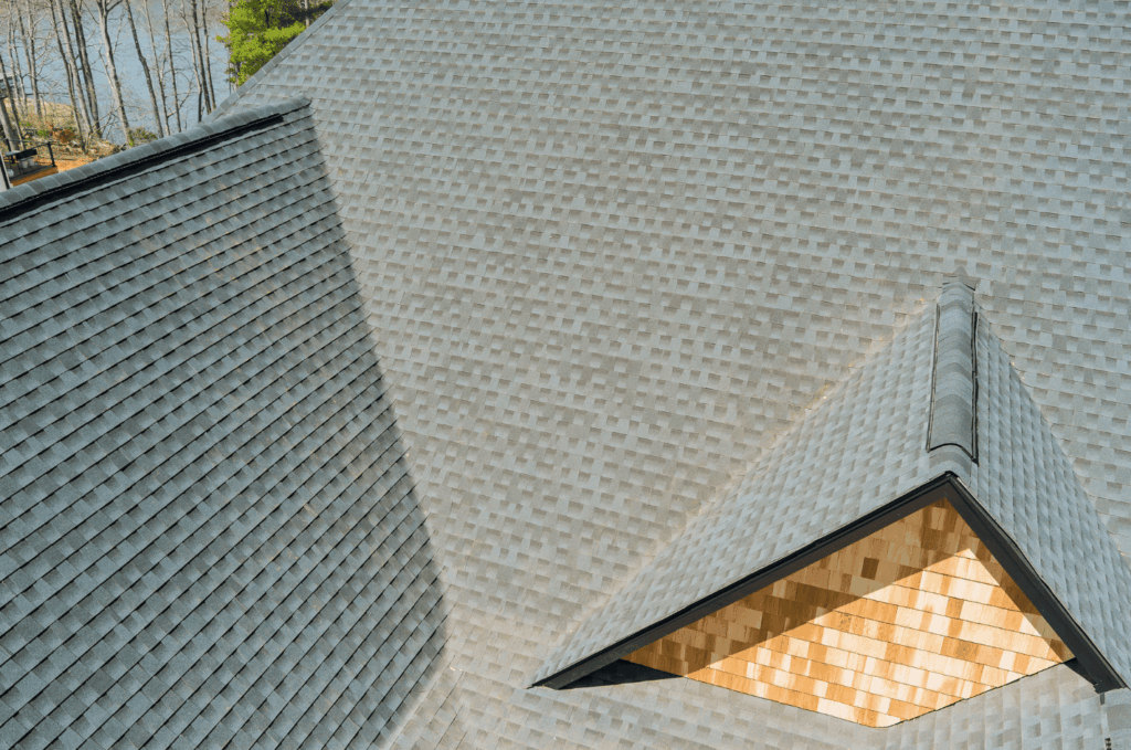 Roof replacement with new shingles improves protection around roof valleys and dormers, helping prevent leaks and damage