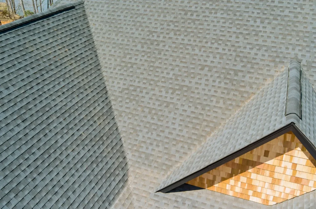 Large shingle roof with clean lines and valleys designed to prevent roof leak issues during heavy rainfall