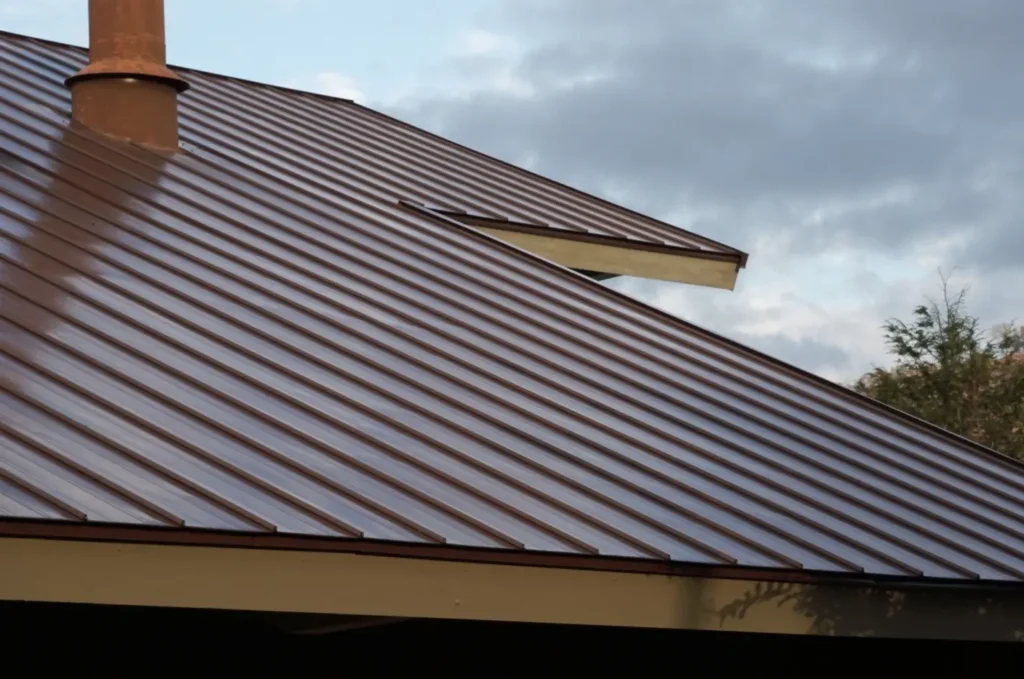 Brown metal roofing system with secure seams built to resist moisture and prevent roof leak problems