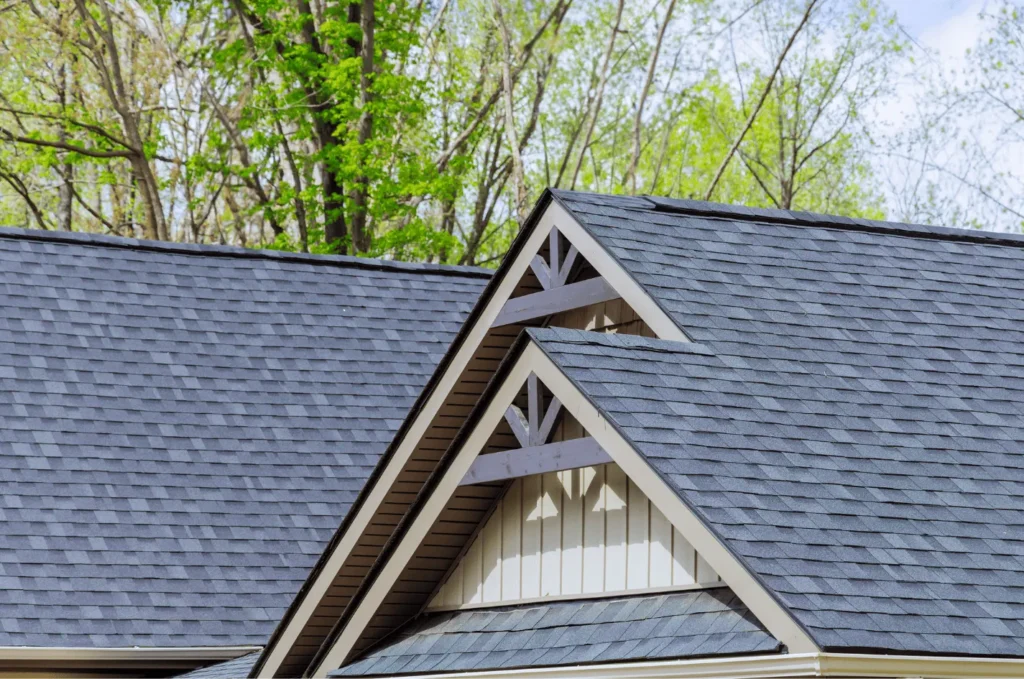 Architectural asphalt shingle roofing system with multiple rooflines, designed for long-term weather protection and curb appeal
