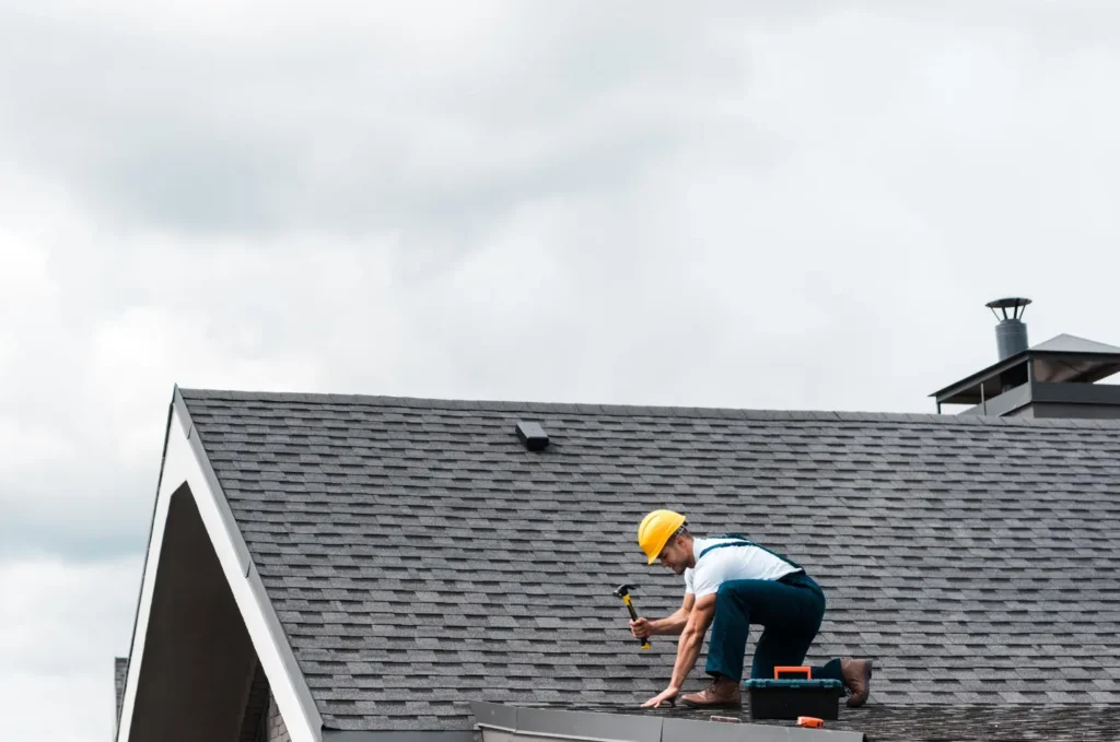 Home roof checked for a possible roof leak around valleys, flashing, and roof transitions