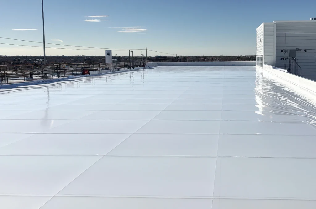 Commercial TPO roof with a smooth white membrane designed for a large low-slope building